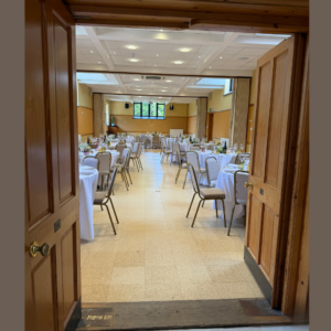 Looking in on our Main Hall setup with 10 round wedding tables.
